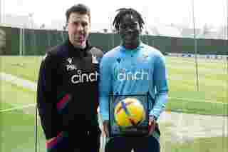 David Ozoh receives his debut ball from Paddy McCarthy