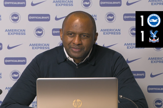 Vieira speaks to the press after a draw in Brighton