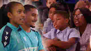 Players visit school for black history month
